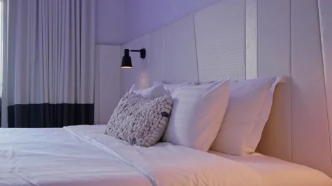 Decoration of pillow on bed in bedroom interior Video stock 320444584