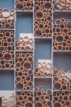 Decoration of plastic pipes in rectangle shaped shelves Stock Photos
