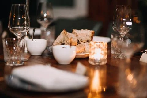 Decoration on restaurant table with bread and blurry background Stock Photos