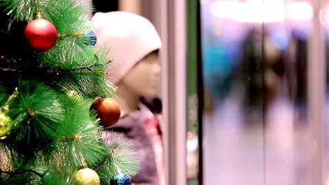 Decoration shine on New Year tree in supermarket hall. Static closeup shot Stock Footage 74734520
