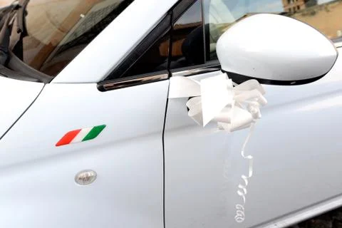 Decoration on the side of a white Italian car Stock Photos
