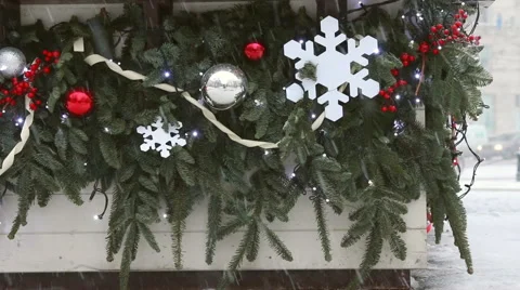 Decoration on the spruce's branches under snowfall. Stock Footage 52461593