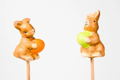 Decoration on a stick - Easter Bunny with egg. Stock Photos