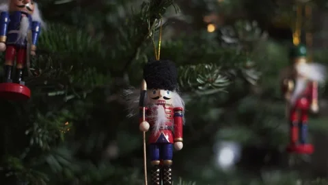Decoration Toy Nutcracker on Christmas Tree. 4K Dolly Slider Shot. Stock Footage 146105672