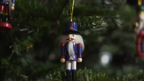 Decoration Toy Nutcracker on Christmas Tree. 4K Dolly Slider Shot. Stock Footage 146105680