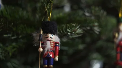 Decoration Toy Nutcracker on Christmas Tree. 4K Dolly Slider Shot. Stock Footage 146105696