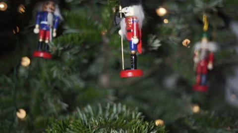 Decoration Toy Nutcracker on Christmas Tree. Nutcracker Soldier on a Stock Footage 146105700