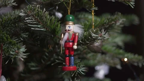 Decoration Toy Nutcracker on Christmas Tree. 4K Dolly Slider Shot. Stock Footage 146105703
