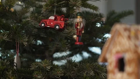 Decoration Toy Nutcracker on Christmas Tree. 4K Dolly Slider Shot. Stock Footage 146105707