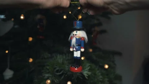 Decoration Toy Nutcracker on Christmas Tree. Nutcracker Soldier on a Stock Footage 146105710