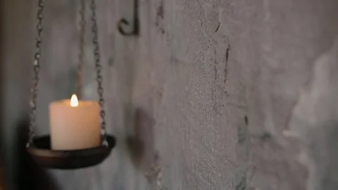 Decoration of the wall with candle Stock Footage 70130397