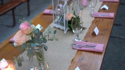 Decorations and serving the wedding table in the forest Video stock 103198314