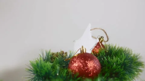 The decorations are white star, red balls, and cones rotate. Stock Footage 221120760