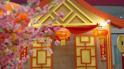Decorations for Chinese New Year: model of traditional house with red lanterns Stock Footage 230476840