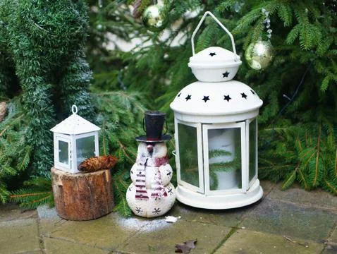 Decorations from lanterns and cones Stock Photos