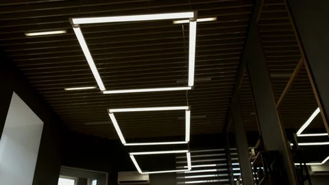 Decorations under the modern ceiling. Linear neon light bulb with background  Stock Footage 119341547