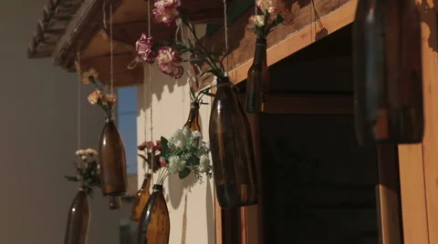 Decorations for wedding, hanging jars with fresh flowers inside. Vídeos de archivo 62434243