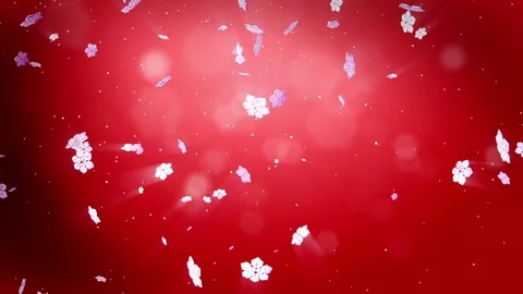 Decorative 3d snowflakes float in air in slow motion at night on a red Stock Footage 81634313