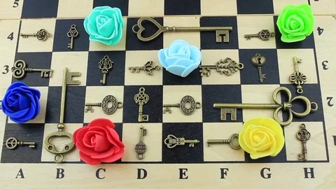 Decorative accessories on a chessboard Stock Footage 79639430