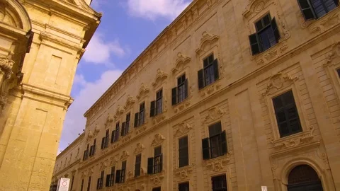 The decorative and ornate architectural elements of the old brown stone Stock Footage 99711125