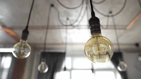 Decorative antique edison light bulbs with straight wire. Big vintage Stock Footage 144550848