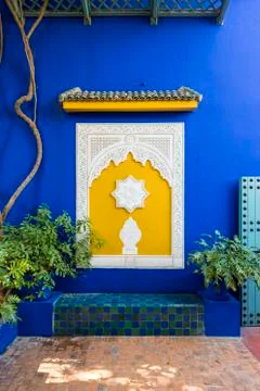 Decorative architectural elements and blue wall at Jardin Majorelle gardens, Stock Photos