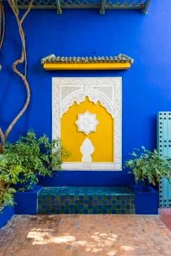 Decorative architectural elements and blue wall at Jardin Majorelle gardens, Stock Photos