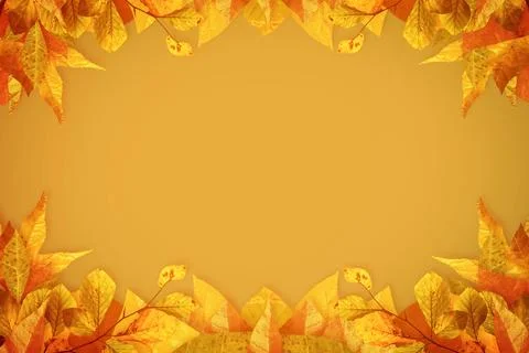 Decorative autumn leaf border is framing golden-yellow background in flat Stock Photos