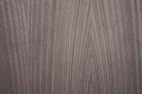 Decorative background in shades of grey with patterns simulating wood. Stock Photos