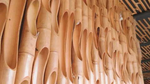 Decorative bamboo wall paneling with hollow cut sections for interior design. Video stock 343405076