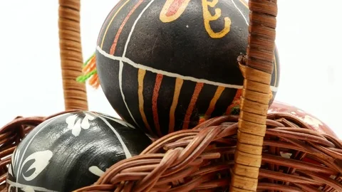 Decorative basket with painted Easter eggs on white background Stock Footage 108637207