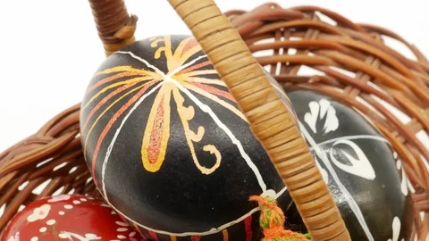 Decorative basket with painted Easter eggs on white background Stock Footage 108638006