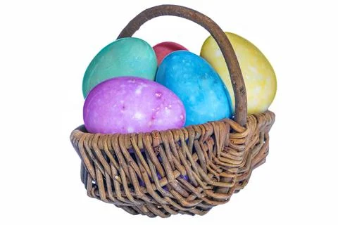 Decorative basket with painted Easter eggs isolated on white background Foto stock
