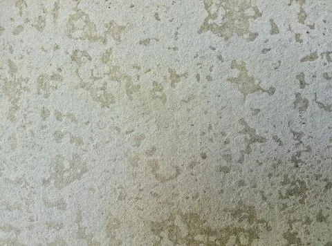 Decorative beige plaster texture imitating old peeling walls Stock Photos