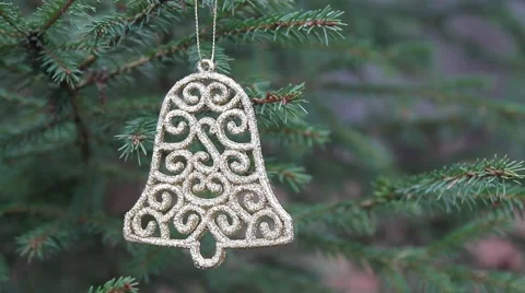 Decorative bell hanging in christmas tree (rack focus) Stock Footage 44220607