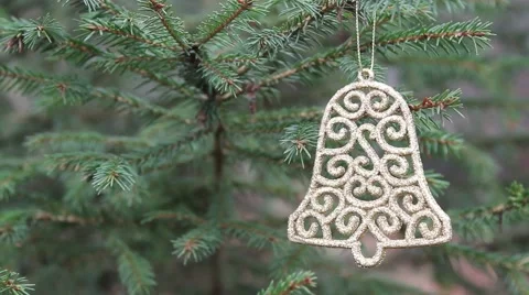 Decorative bell hanging in christmas tree (panning) Stock Footage 44221022