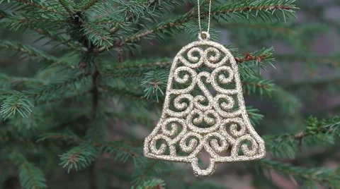 Decorative bell hanging in christmas tree (rack focus) Stock Footage 44221094