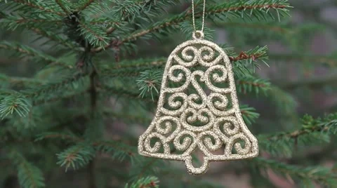 Decorative bell hanging in christmas tree Stock Footage 44221306