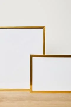 Decorative blank frames wooden table Fotos Stock