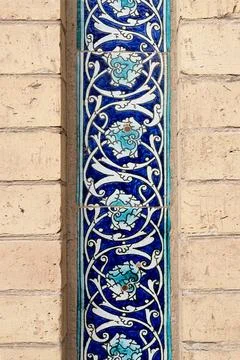Decorative blue ceramic tilework with floral arabesque pattern on the Pahla.. Stock Photos