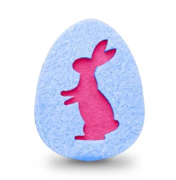 Decorative blue easter egg made of felt with the silhouette of an Easter bunny Stock Photos