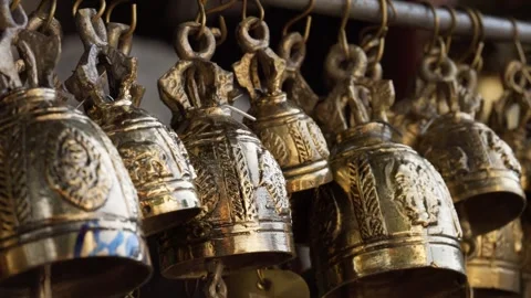 Decorative Brass Bells Hanging in Local Market Video stock 343254922