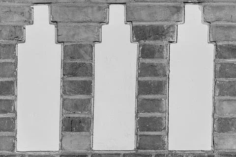 Decorative Brick Wall with Three Vertical Plaster Columns 스톡 사진