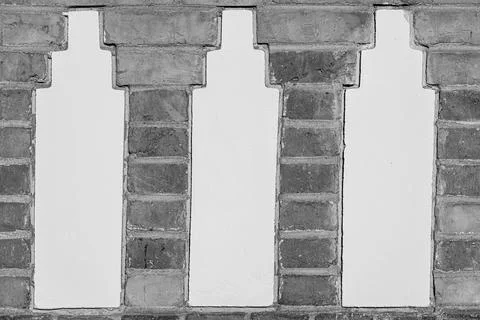 Decorative Brick Wall with Three Vertical Plaster Columns Fotos de archivo