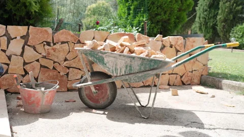 Decorative bricklaying on construction site, worker preparing industrial Stock Footage 228967954