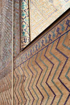 Decorative brickwork and glazed tile patterns on the facade of Bibi Khanum .. Stock Photos