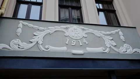 Decorative Building Facade Ornament With Year Inscription On Urban Architecture Stock Footage 332762256