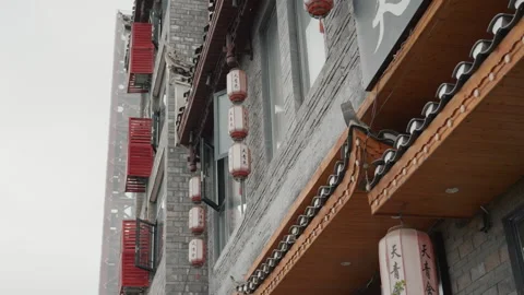 Decorative building features. Vivid facade with cultural elements. Intricate Stock Footage 335163992