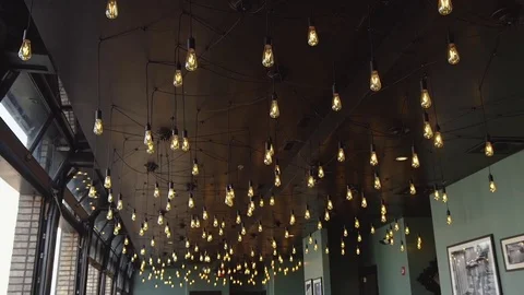 Decorative bulbs on the ceiling, bulbs in restaurant in the center of Nashville Stock Footage 83533311