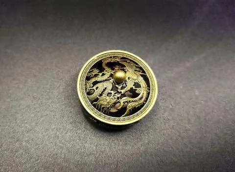 Decorative Button with Dragon Stock Photos